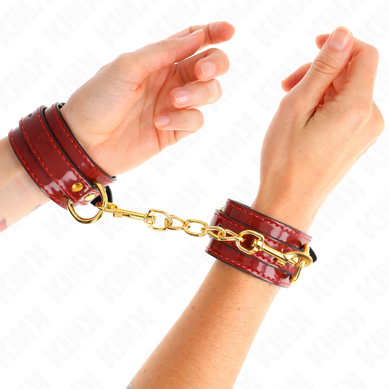 KINK - JOANNA ANGEL ROOD VERSTELBARE POLSBANDJES MET GOUDEN KETTING 16,5-26 CM X 4 CM